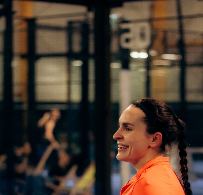 Player gripping a padel racket